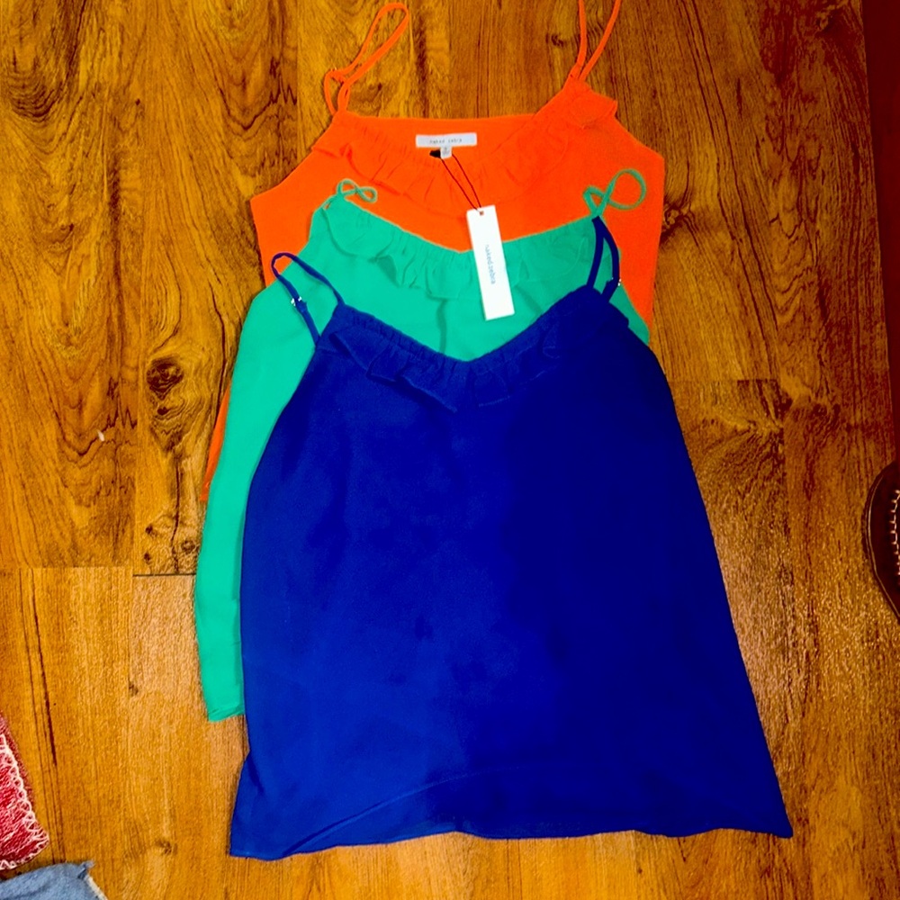 Three naked zebra tank tops, all size small 1orange, 1blue and 1green